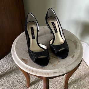 Black glitter satin “Fern” by Nina New York 7.5